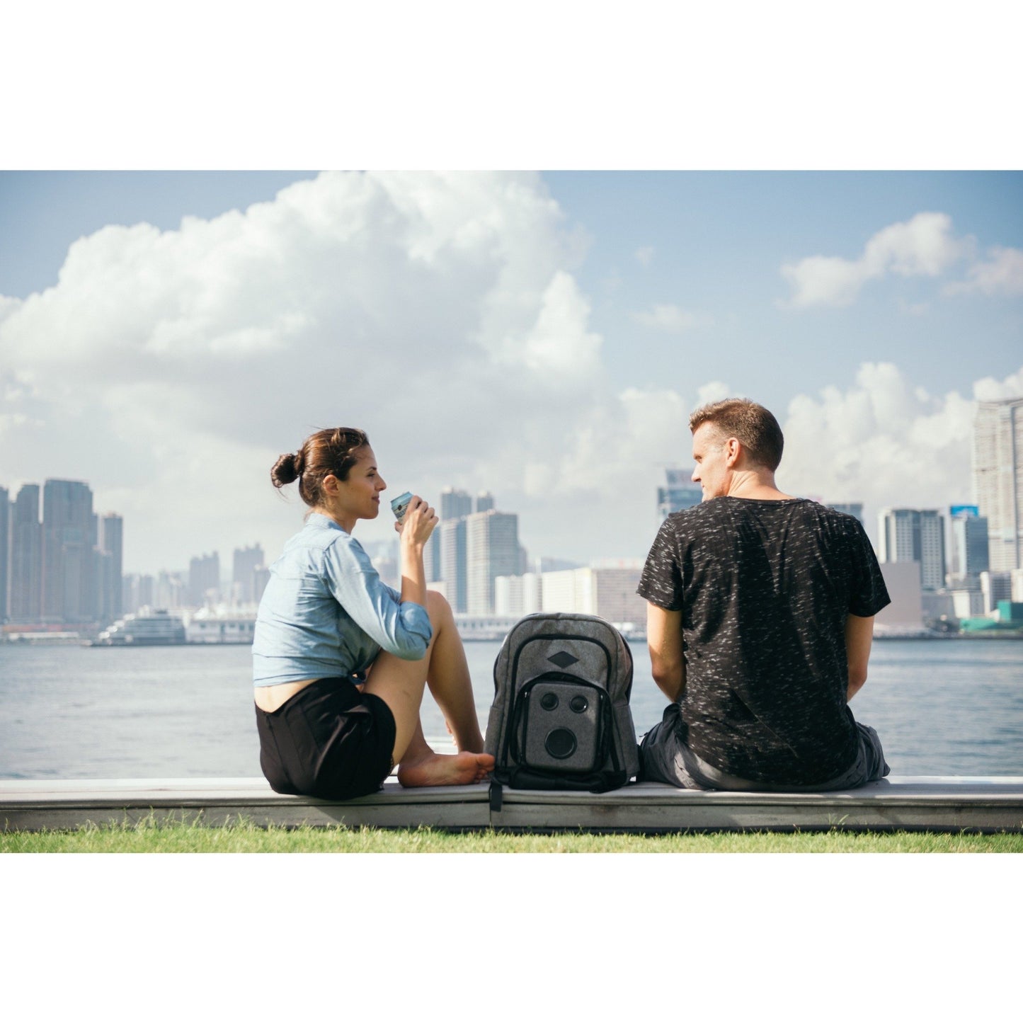 Backpack With Speakers Near The Water